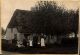 Carl Christian Rossen with his family in front of their house in 1905