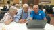 James 'Jim' Peter Nelsen showing Robert Rossen Thomsen and wife Veda (nee Amstuz) family related things at the Rossen Reunion in Curtis, Nebraska on 22 Jun 2016