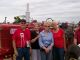 James Peter 'Jim' Nelsen, his cousin Sandi Foran (nee Awtry), his sister Diane Pollman (nee Nelsen) and his cousin Carolyn Wolgamott (nee Schmid) in fron of Jim´s grandfather Peter Christian Nelsen´s last farm tractor